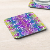 おもしろい紫、青、黄色のお洒落ハート コースター (左側)