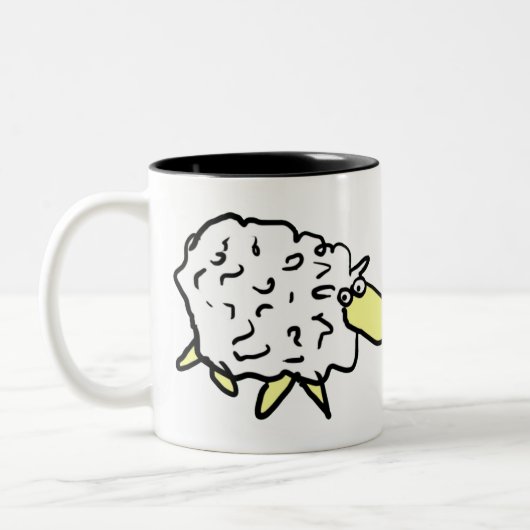 おもしろい羊のイラストレーション ツートーンマグカップ (左)