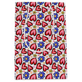 おもしろい赤いハートと紫色の黄色い花 ミディアムペーパーバッグ (正面)