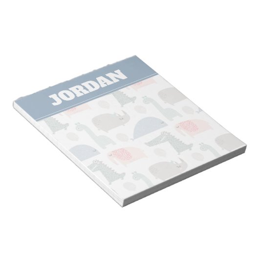 おもしろい顔かわいいドードル動物のパターン ノートパッド (アングル)