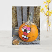 おもしろい顔オン色彩の鮮やかハロウィーンパンプキン カード (黄色い花)