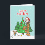 おもしろいChristmas Card - Santaとそのヘルパー シーズンカード<br><div class="desc">このトナカイはサンタ救済に木に喜んで飾いる。このホリデーカードは誰かのスマイルを作るのに最適である。</div>