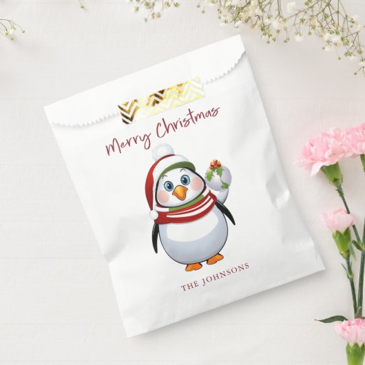 おもちゃのペンギンがオーナメントを持ってる メリークリスマス フェイバーバッグ (封をした状態)