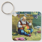 おもちゃの人形を作るサンタクロース、ビンテージクリスマス キーホルダー (正面)