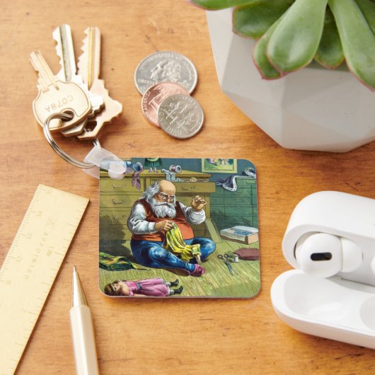 おもちゃの人形を作るサンタクロース、ビンテージクリスマス キーホルダー (デスク)