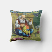 おもちゃの人形を作るサンタクロース、ビンテージクリスマス クッション (裏面)