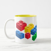 おもちゃの建物レンガカラフルの子供 ツートーンマグカップ (左)