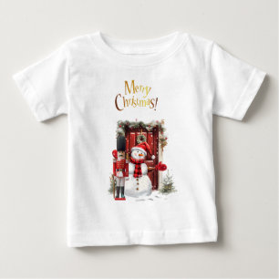 おもちゃブリティッシュ兵士のベアスキン帽子と雪だるま ベビーTシャツ