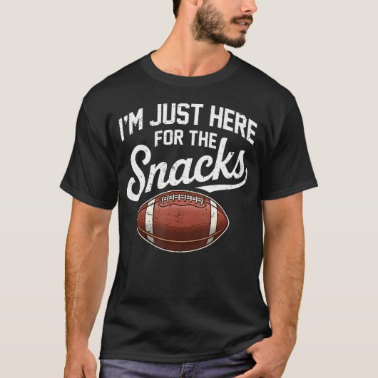 おやつ目当てだけ アメフト ジョークTシャツ Tシャツ (正面)