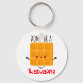 お世辞を言うな キーホルダー (正面)