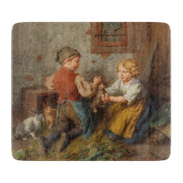 お友達(幼い遊男の子とペットのうさぎ) カッティングボード