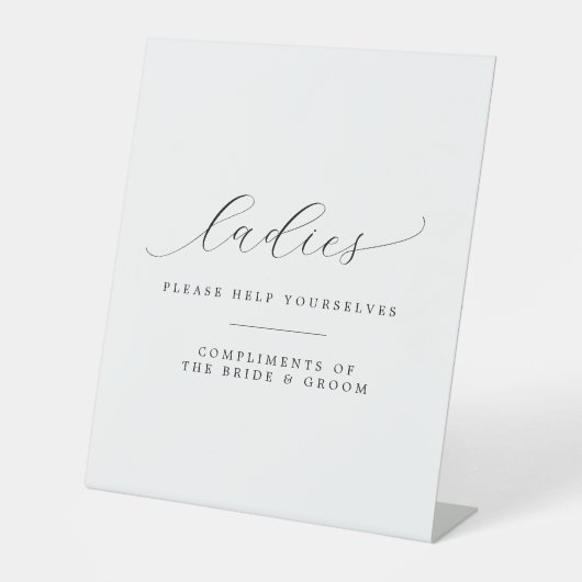 お嬢さん救済はトイレ結婚の 台座サイン (正面)