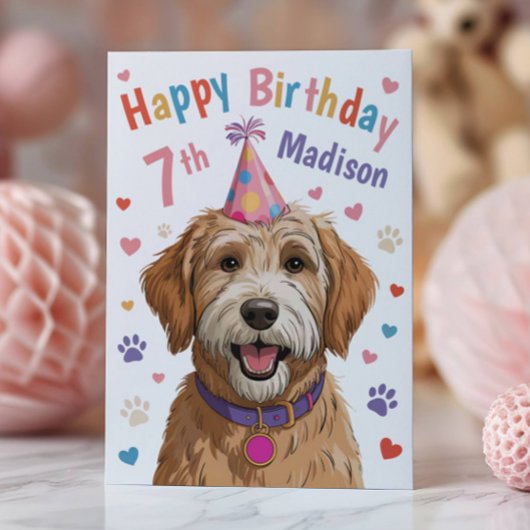 お子様のためのかわいい犬の7歳の誕生日カード カード