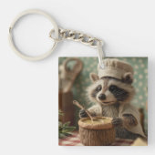 お椀魅力的をかき混ぜるかわいいラクーンのシェフ キーホルダー (正面)