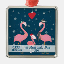 お母さんおよびパパのフラミンゴのとして初めてのクリスマス雪片