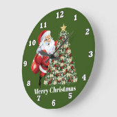 お祝いのクリスマスサンタおよび木 ラージ壁時計 (傾斜)
