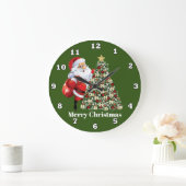 お祝いのクリスマスサンタおよび木 ラージ壁時計 (ホーム)