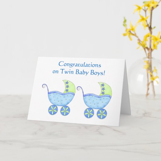 お祝いの対の男の赤ちゃんの青の乳母車 カード (黄色い花)