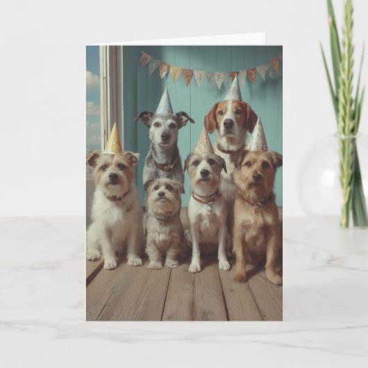 お祝いの帽子をかぶった犬の誕生日パーティー カード (正面)
