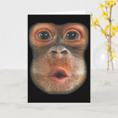 お腹を出して笑う猿の顔 カード (黄色い花)