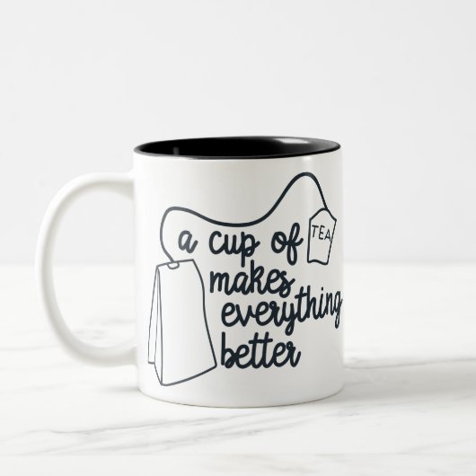 お茶おもしろいを飲むと万事好転する ツートーンマグカップ (左)