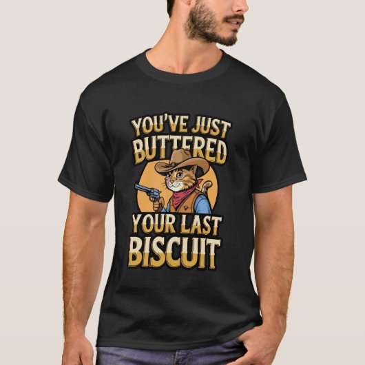 お茶の間西部劇猫が最後のビスケットにバターを塗る面白いデザイン Tシャツ (正面)