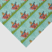 お茶わんのクリスマスパターンに座るオレンジ色の猫 薄葉紙 (詳細)