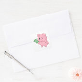 お金持ちのピンクの豚が現金を持って親指を立てている スクエアシール