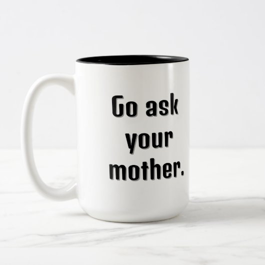 お頼母さんの大きおもしろいい文字のマグカップ ツートーンマグカップ (左)