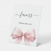 お favors の看板 ピンクの蝶結び 白 台座サイン (正面)