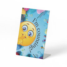 かぎ針または編み物の立看板を数えている