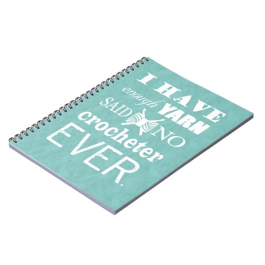 かぎ針編み不十分な糸の工芸品ダーク ノートブック (左側)