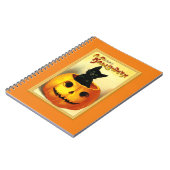 かぼちゃのランタンに座るハロウィンの猫 ノートブック (左側)