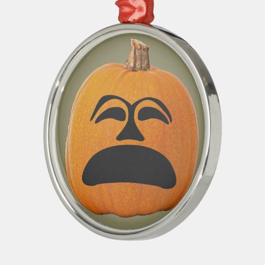 かぼちゃのランタン 不機嫌な顔、ハロウィンのかぼちゃ メタルオーナメント (左)