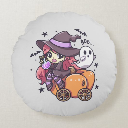 かぼちゃの車に座るかわいいキッドウィッチ ラウンドクッション (正面)