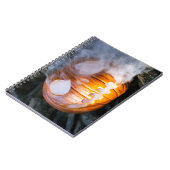 かぼちゃランタン ハロウィンのかぼちゃの頭が燃えている ノートブック (左側)