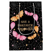 かわいいこうもり、風船、クモの巣ハロウィーン ミディアムペーパーバッグ (裏面)