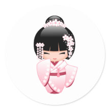 かわいいこけし人形のピンクの着物