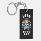 かわいいつるこうもりとレトロの夕日 | 出てくつるれ キーホルダー (正面左)