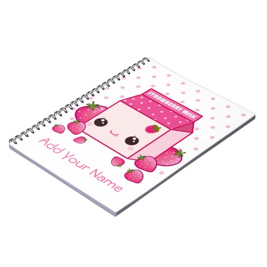 かわいいのいちごが付いているピンクのミルクのカートン ノートブック (左側)