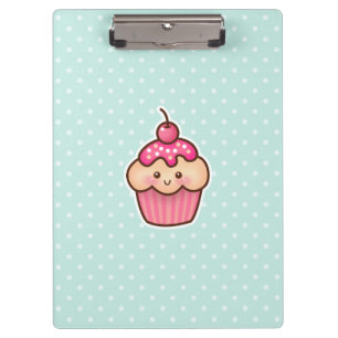 かわいいのピンクのカップケーキおよびかわいく真新しく青い水玉模様 クリップボード