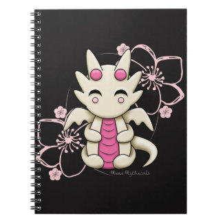 かわいいのピンクのドラゴンの螺線形ノート ノートブック