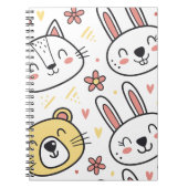 かわいいよくはしゃぐアニメの動物とシームレスなパターン ノートブック (正面)