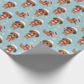 かわいいよくはしゃぐ犬と雪片クリスマス ラッピングペーパー (角)