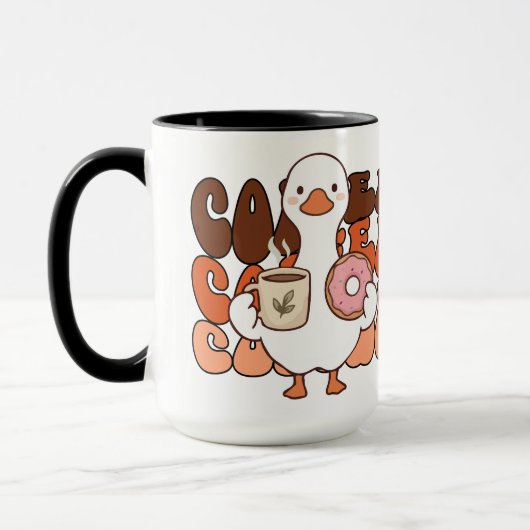 かわいいアヒルのコーヒーやお茶  マグカップ (左)
