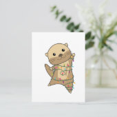 かわいいオッターのクリスマス　雪　冬の動物　オッター シーズンポストカード (スタンド正面)