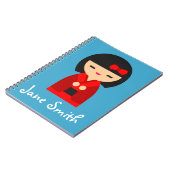 かわいいオレンジこけし日本の人形 ノートブック (左側)