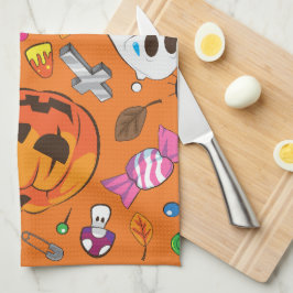 かわいいオレンジ色のハロウィンカボチャとキャンディ キッチンタオル