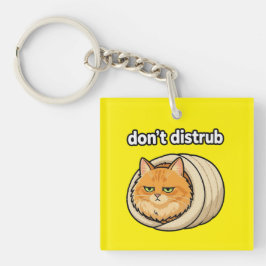 かわいいオレンジ色の猫デザインの「邪魔しないで」ボタン キーホルダー