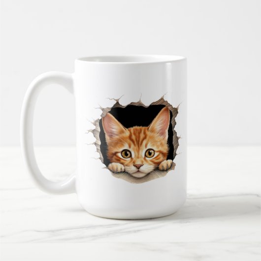 かわいいオレンジ色の虎猫子猫が覗き出す コーヒーマグカップ (左)